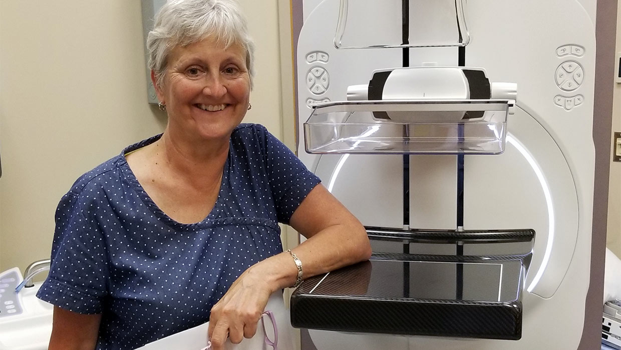 Wendy Scott with new mammography unit Wendy Scott with new mammography unit