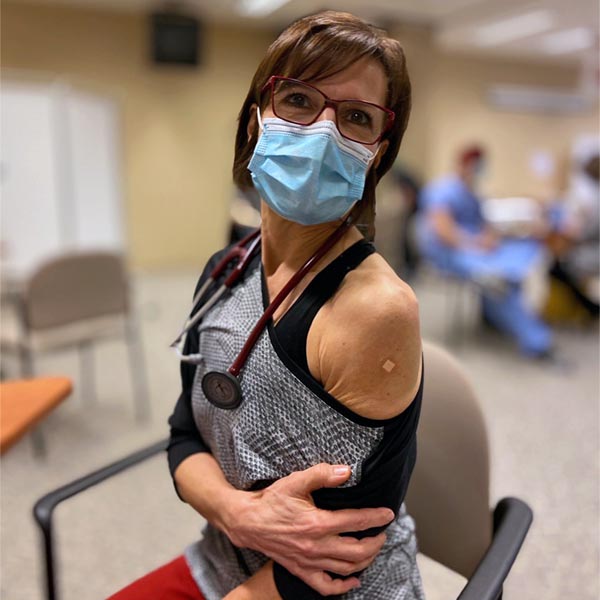 Dr Kathy receives the Covid-19 Vaccine